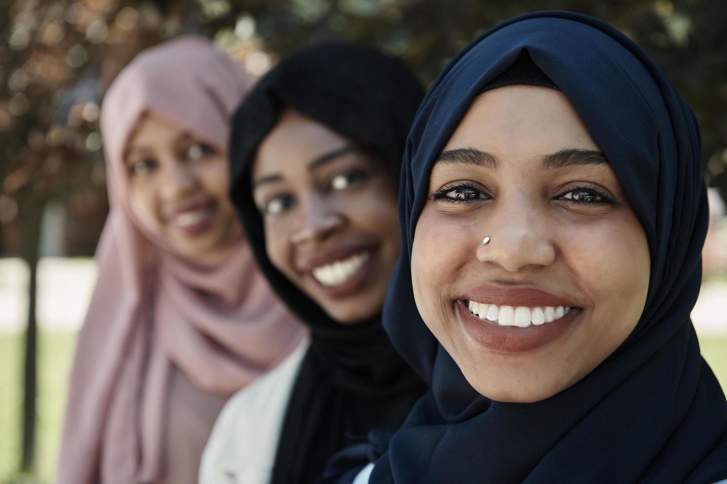 businesswoman group portrait  wearing traditional islamic clothes photo