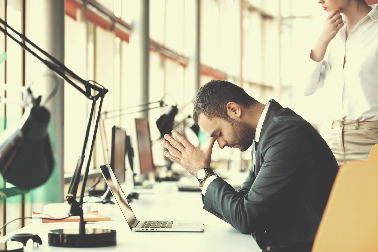 frustrated young business man photo