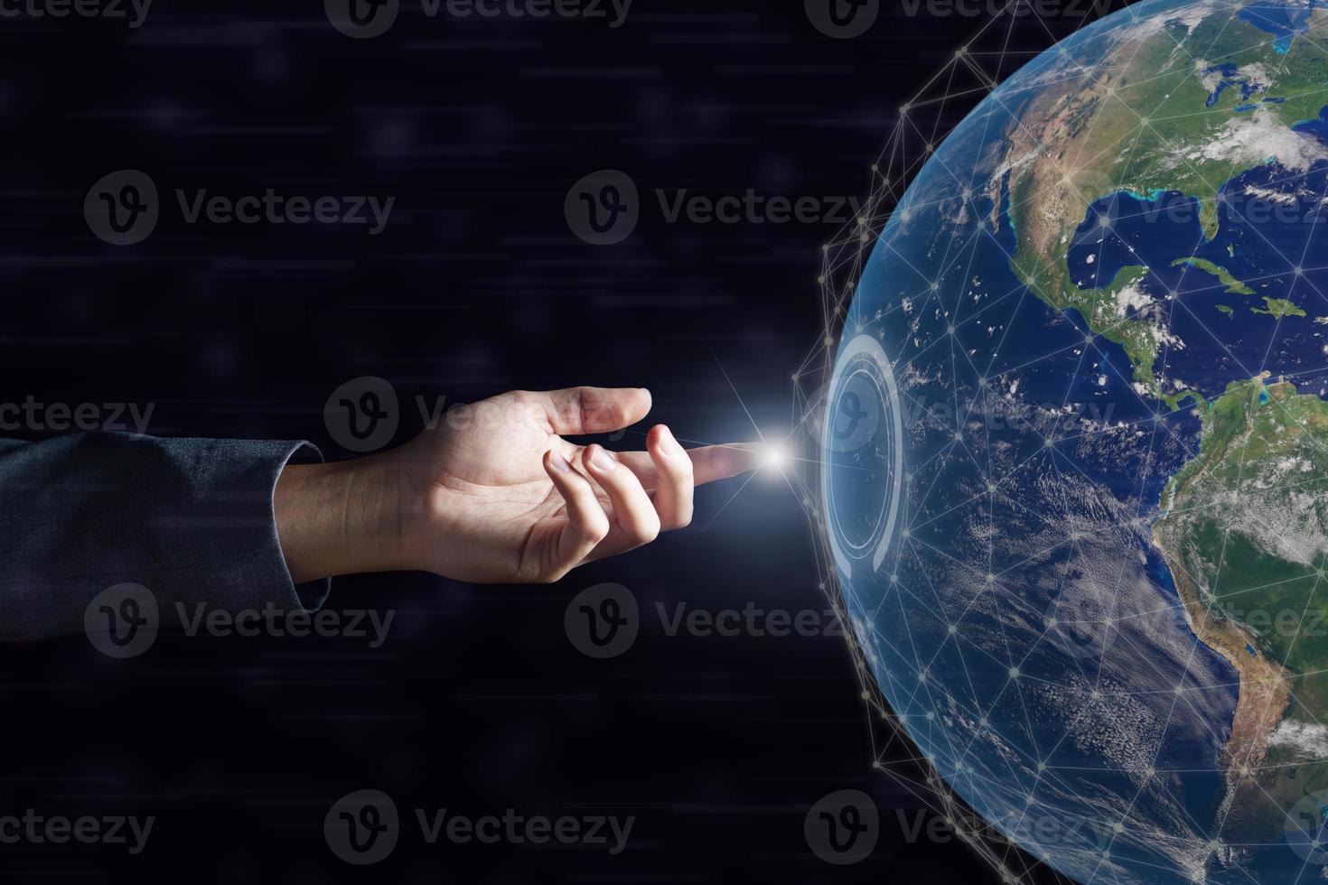 Business hand touching global network and data exchanges over the world on dark . Elements of this image furnished by NASA photo