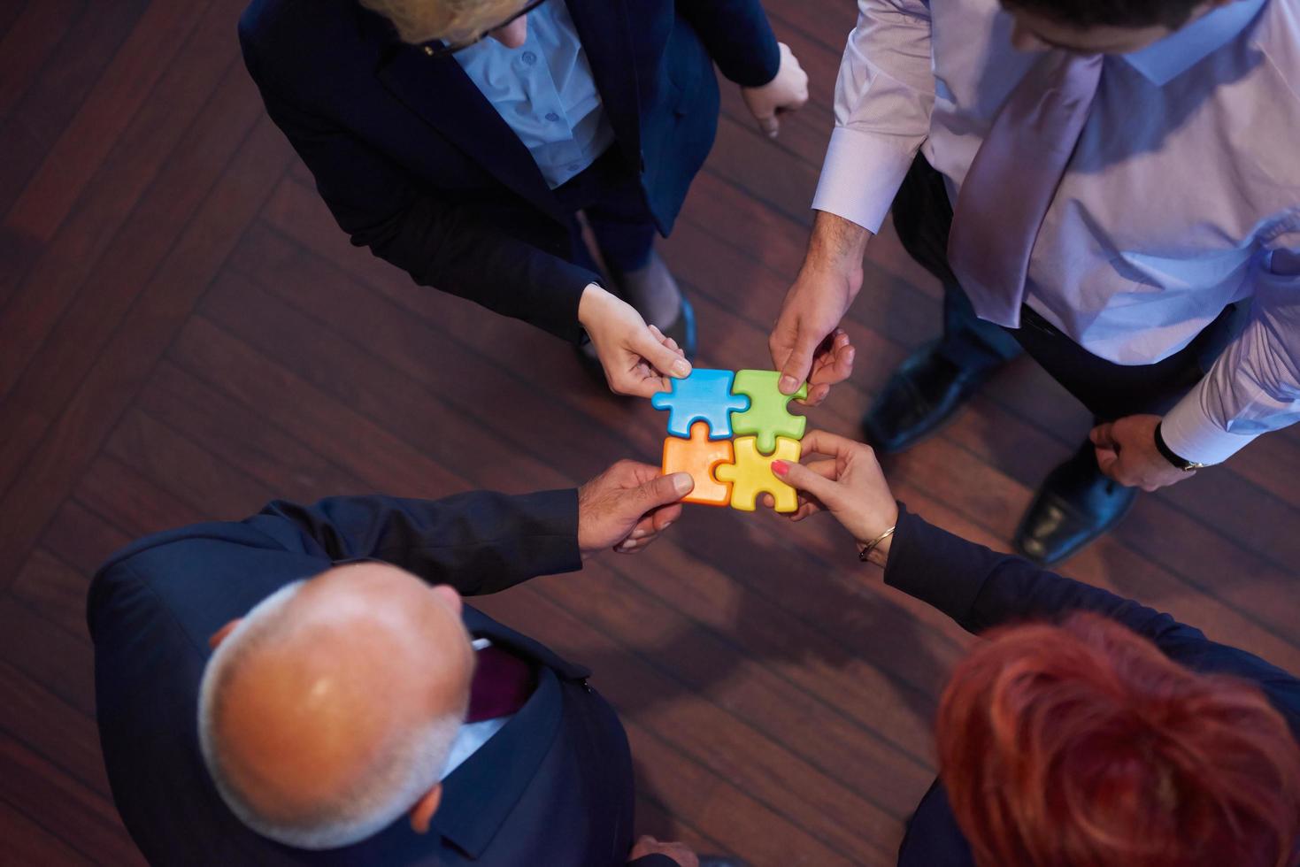 assembling jigsaw puzzle photo