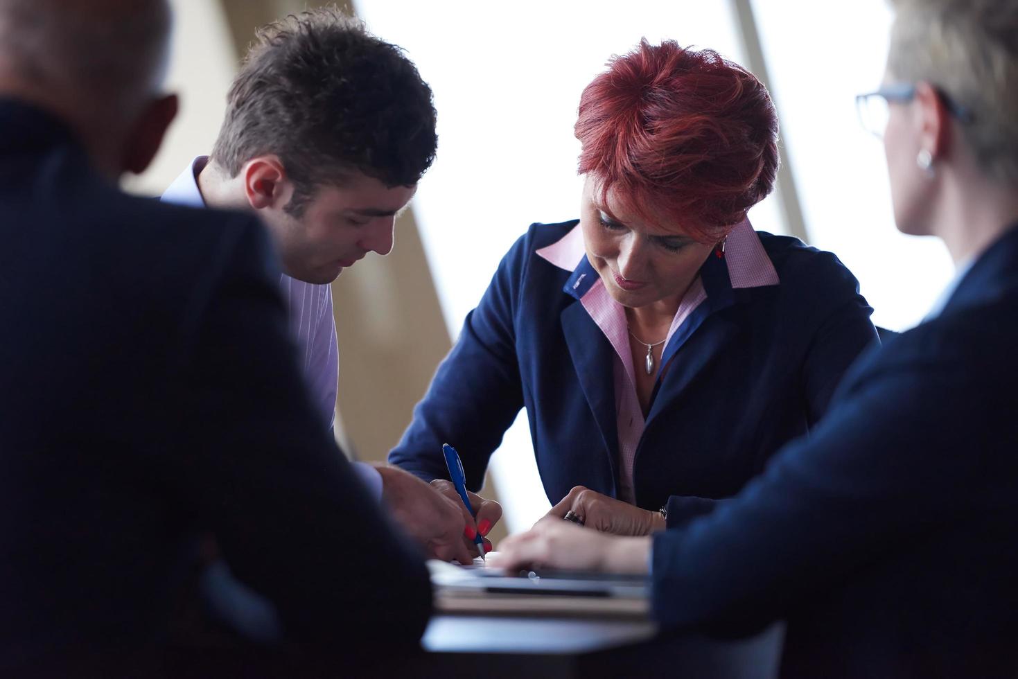 business people group sign contract photo