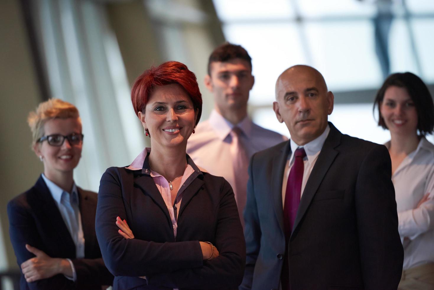 diverse business people group with redhair  woman in front photo