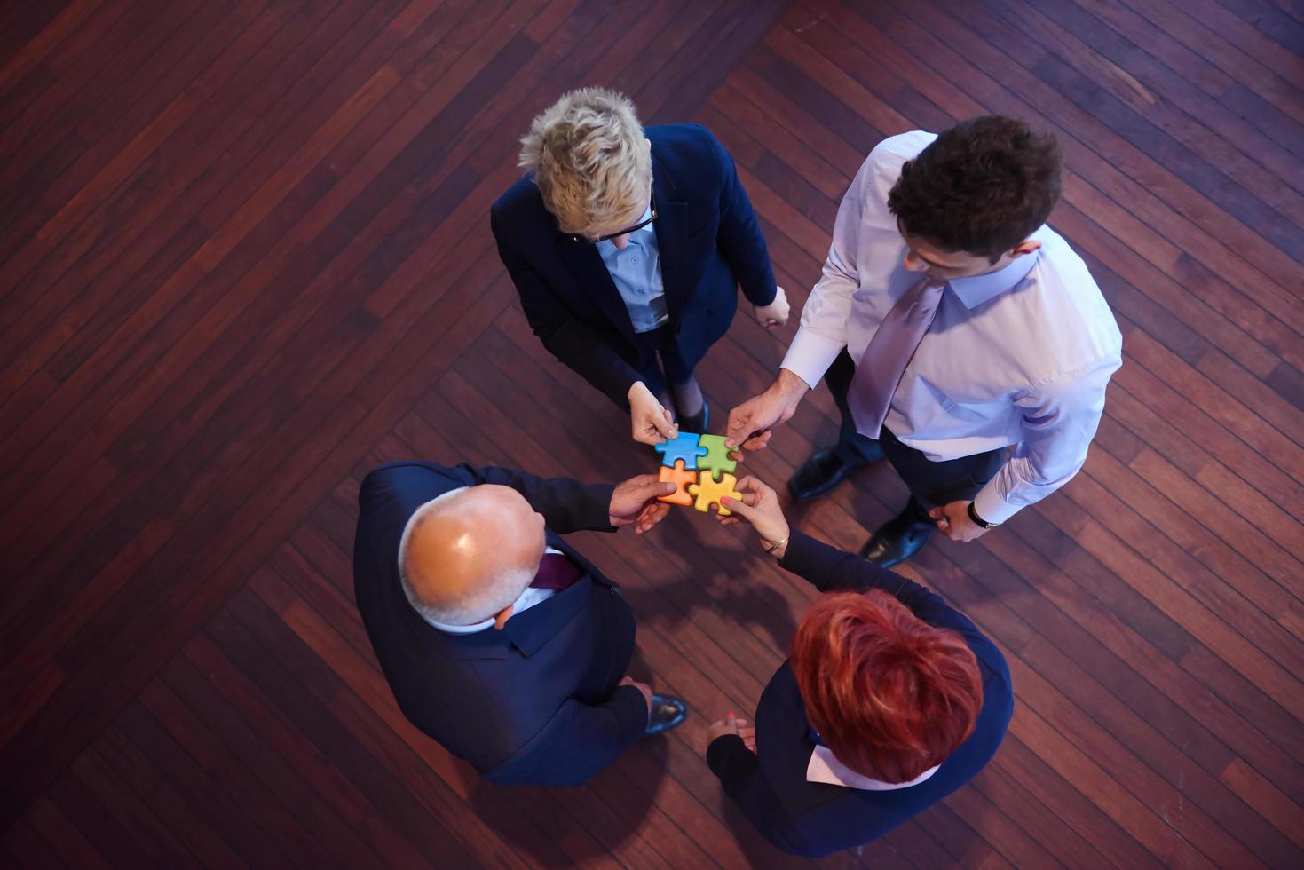assembling jigsaw puzzle photo