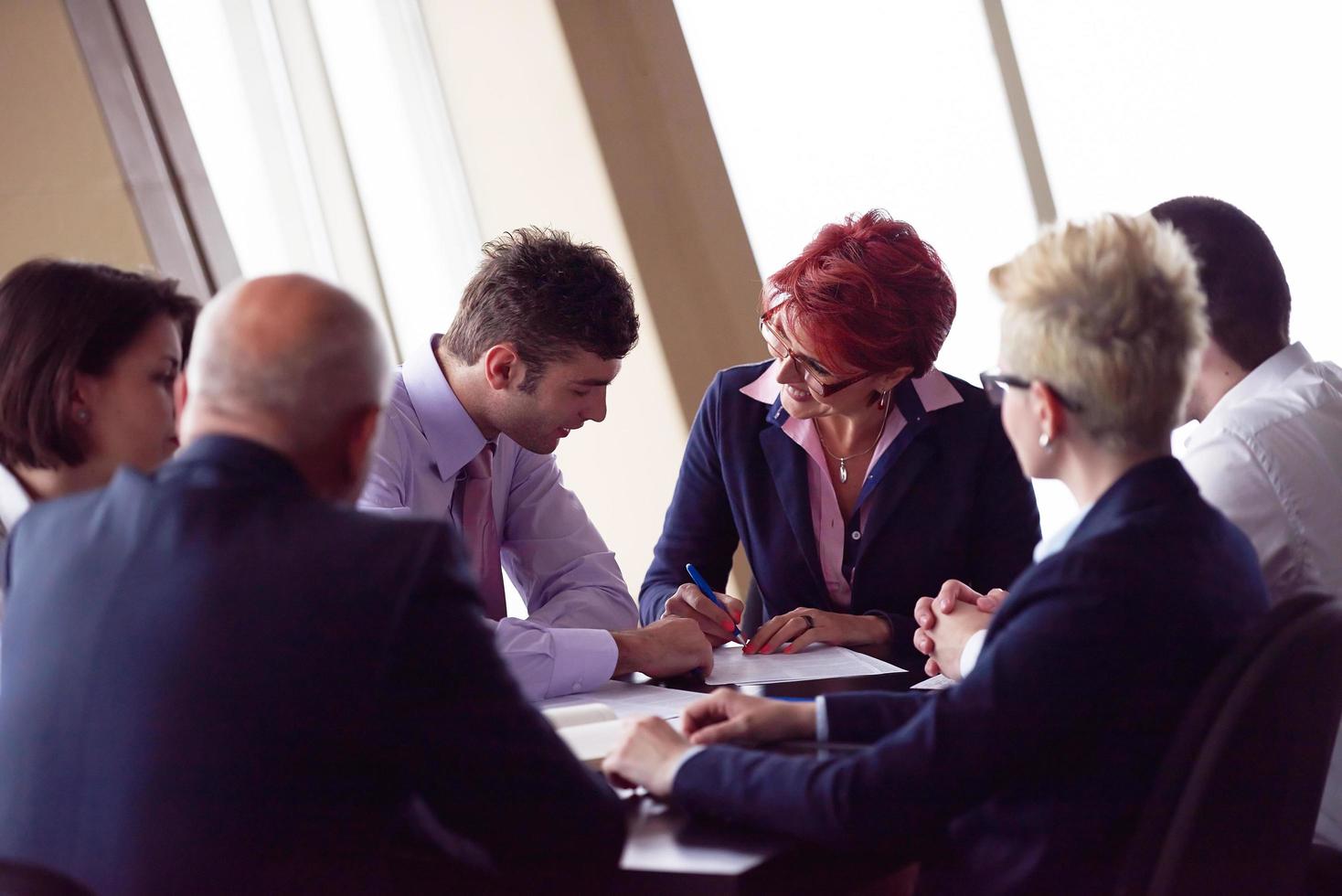 business people group sign contract photo