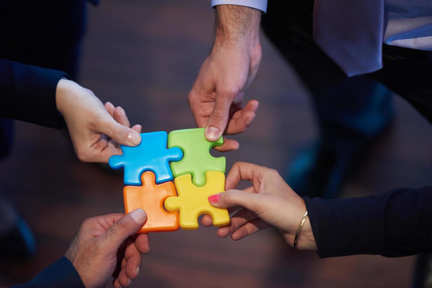 assembling jigsaw puzzle photo