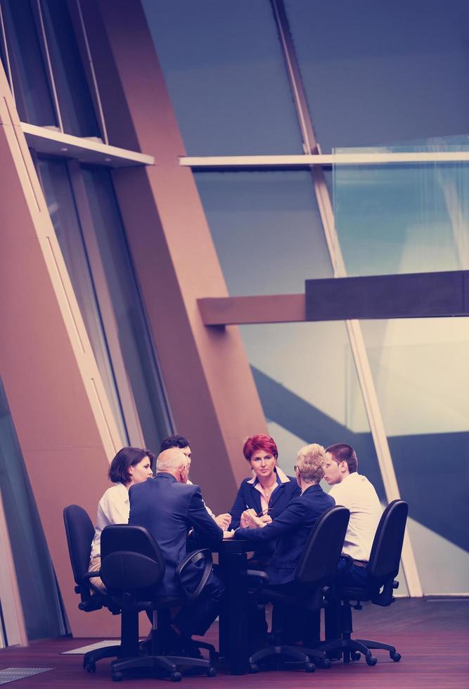 business people group on meeting at modern bright office photo