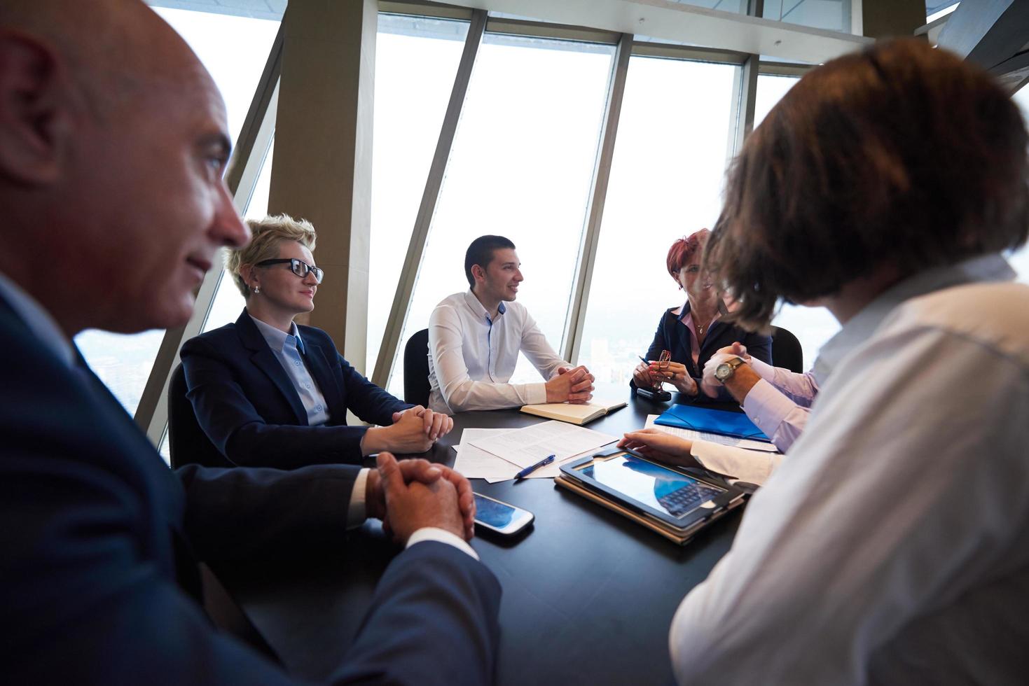 business people group on meeting at modern bright office photo