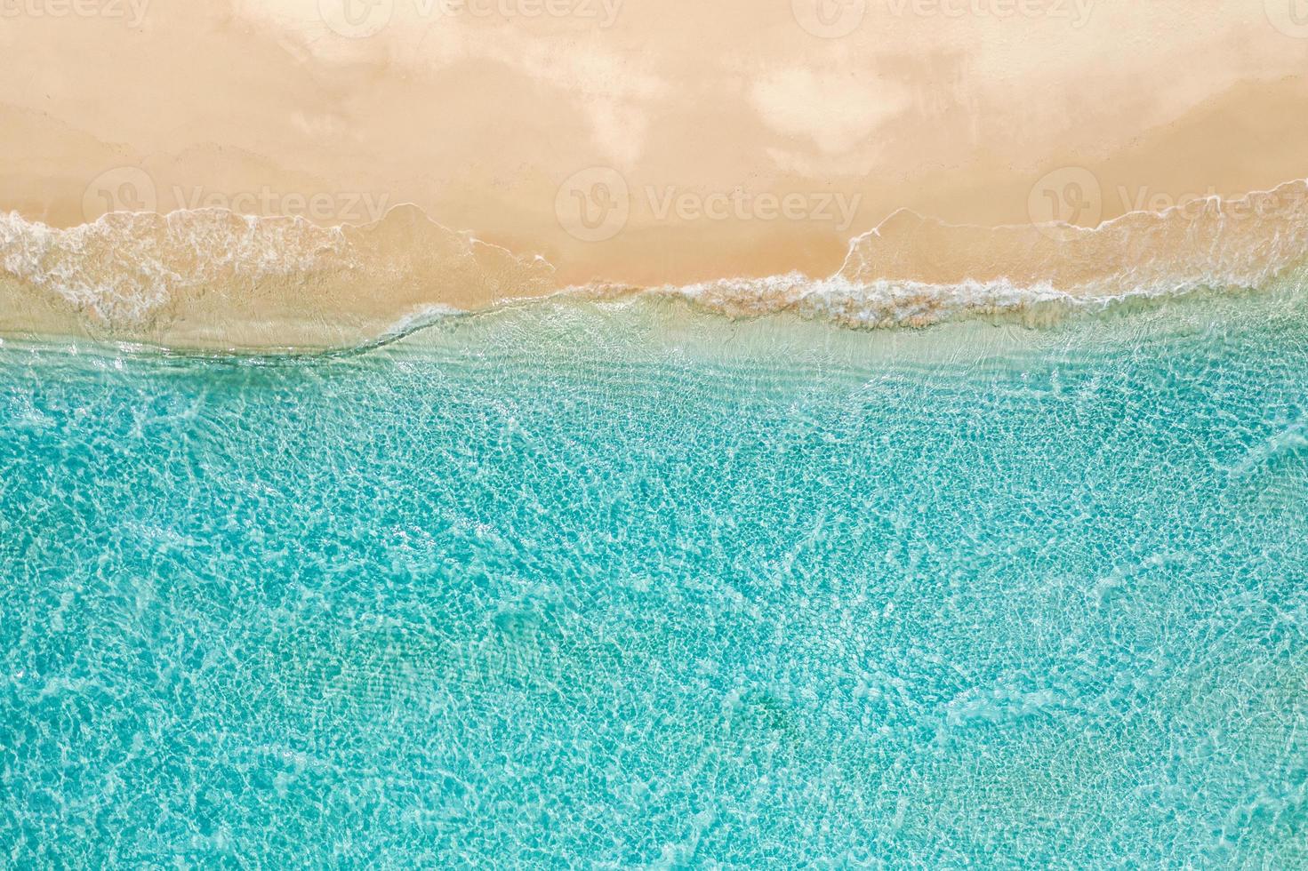 Beautiful aerial beach landscape, summer vacation holiday template banner. Waves surf with amazing blue ocean lagoon, sea shore, coastline. Amazing aerial drone top view. Relaxing bright beach seaside photo