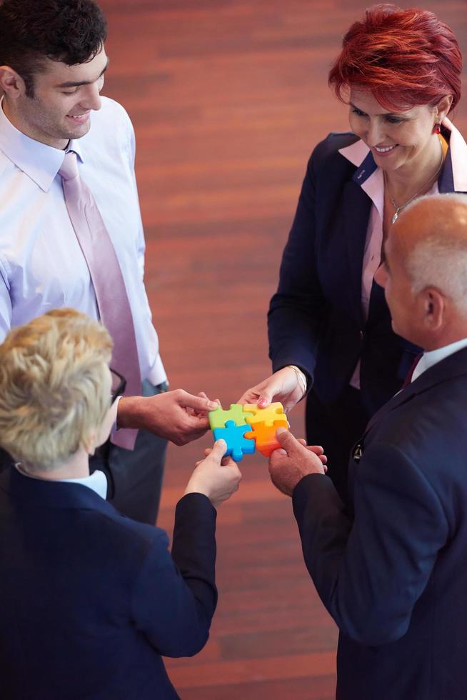 assembling jigsaw puzzle photo