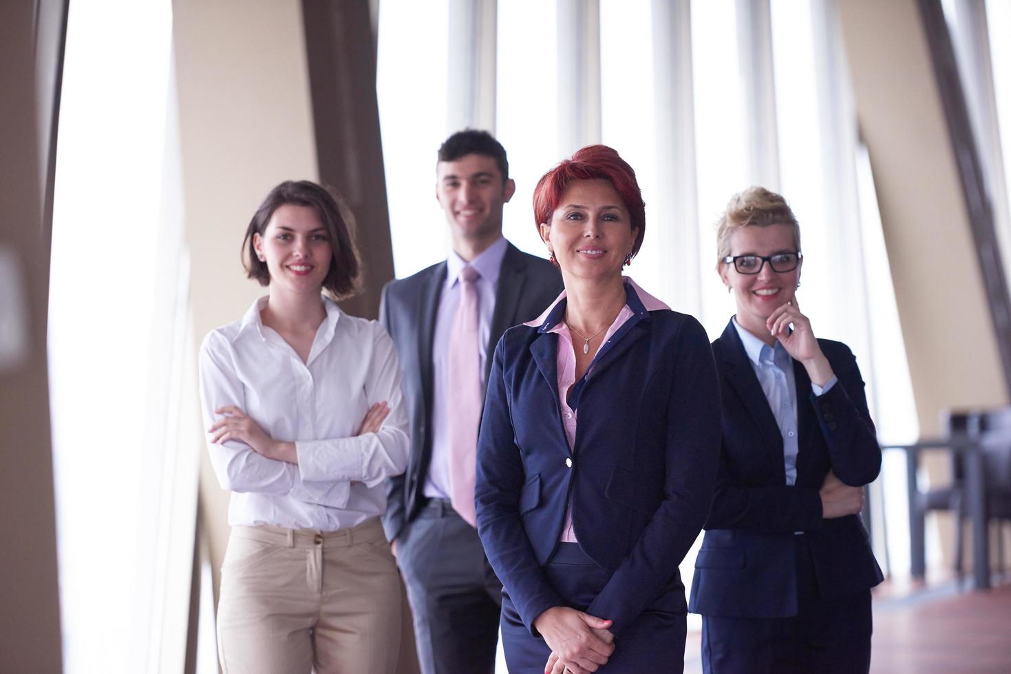 diverse business people group with redhair  woman in front photo