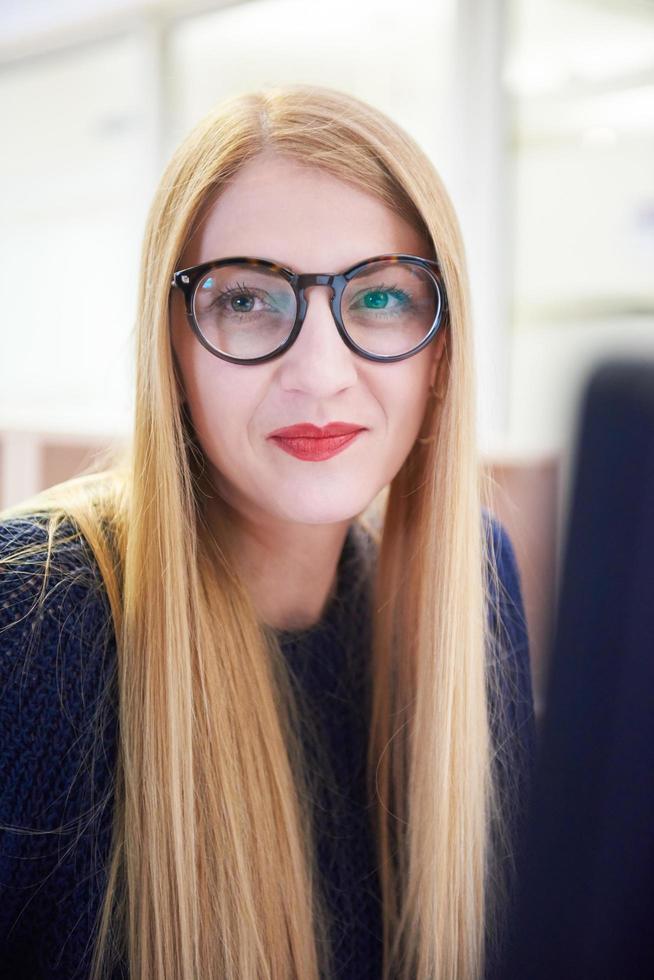 business woman working on computer at office photo