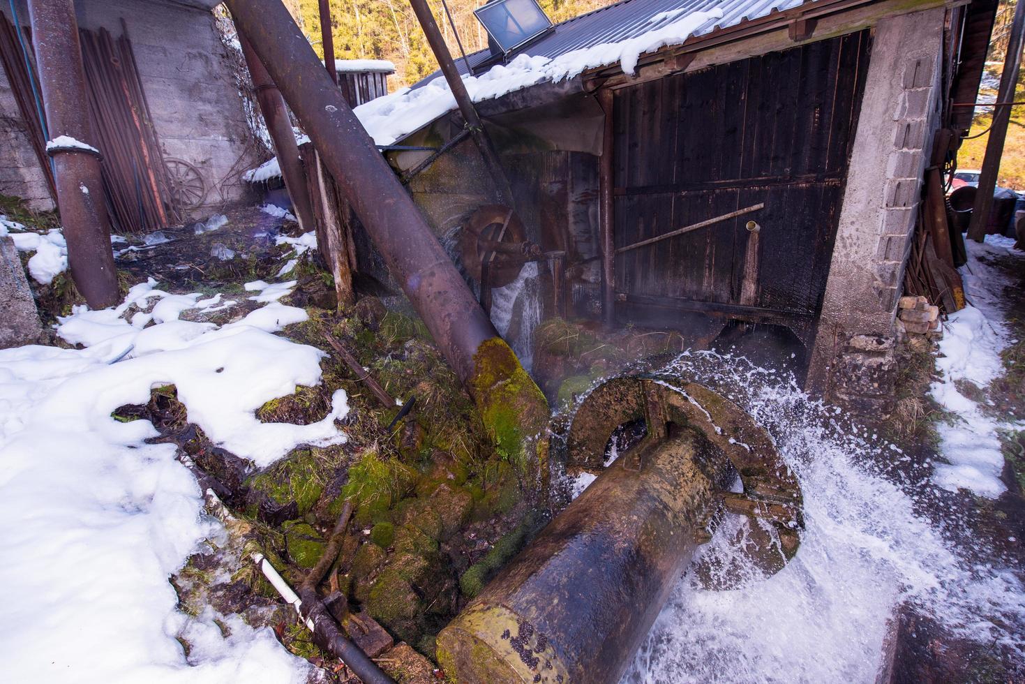 Rural landscape with old watermill in woods photo