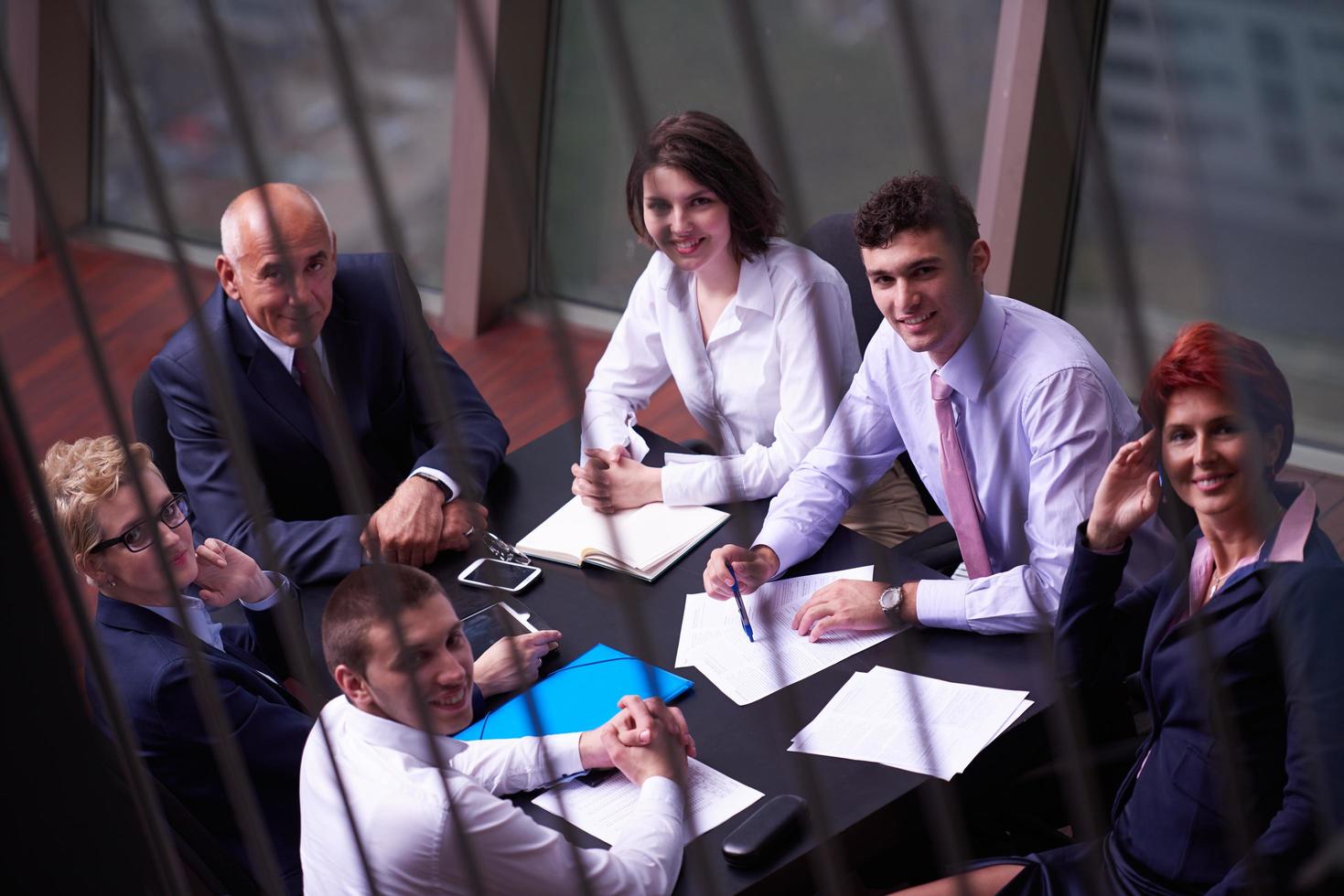 business people group on meeting at modern bright office photo