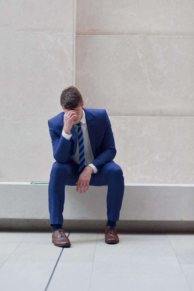 frustrated young business man photo