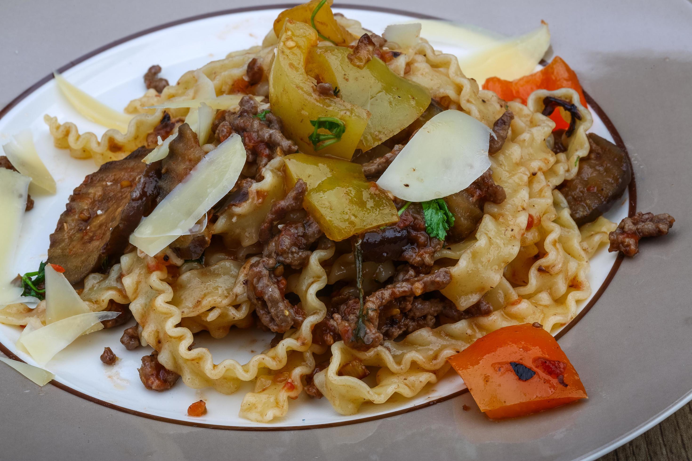 Pasta mafalde on the plate 12510454 Stock Photo at Vecteezy