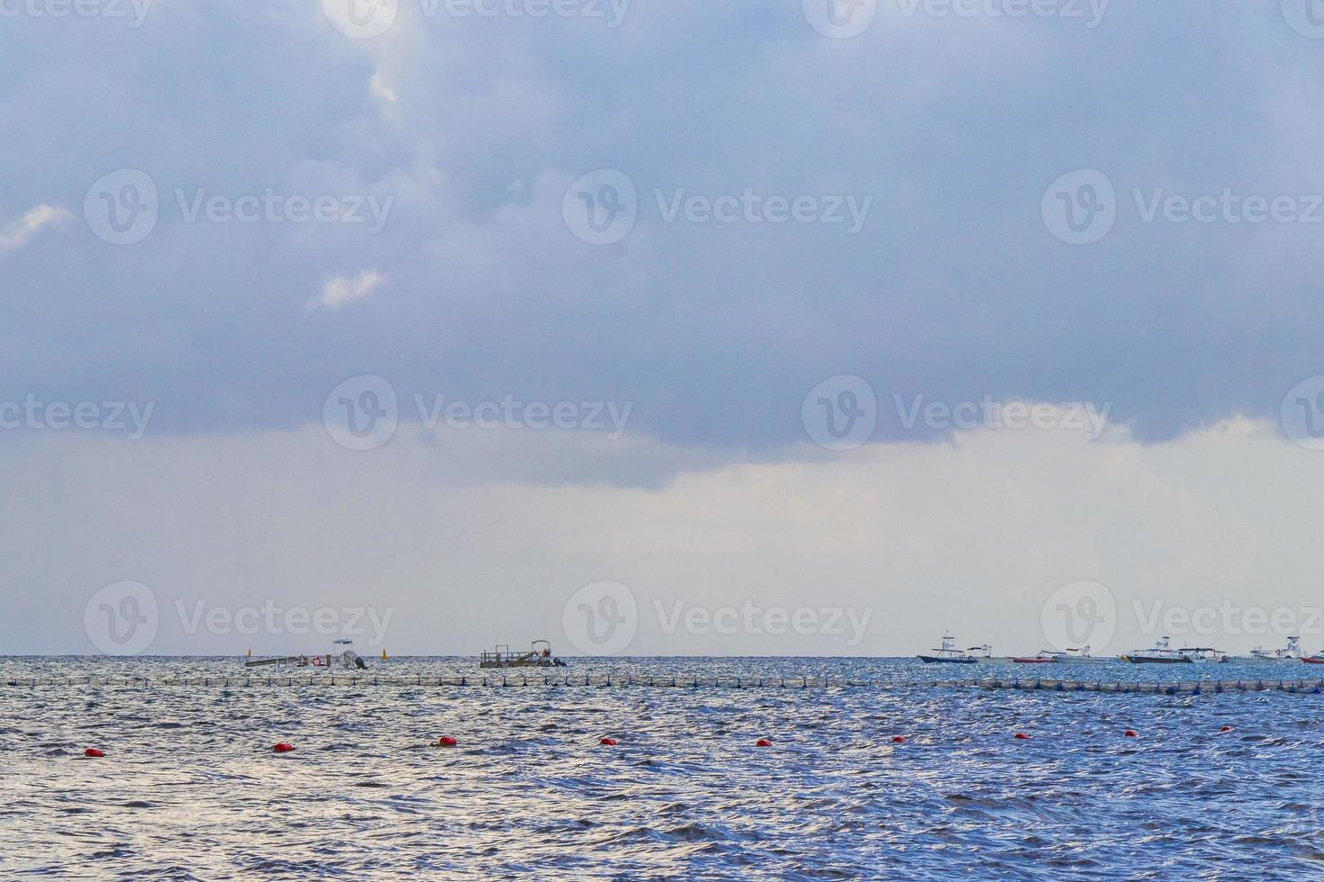 Boats yachts ship jetty beach in Playa del Carmen Mexico. photo