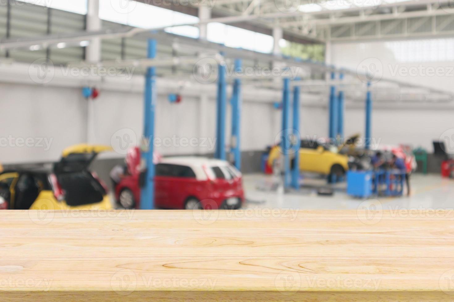 car service centre with auto at repair station bokeh light defocused blur background photo