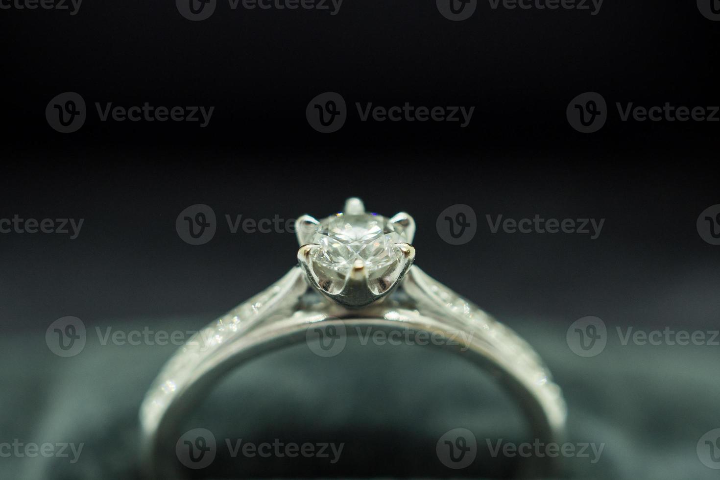 close up luxury wedding diamond ring in jewelry gift box photo