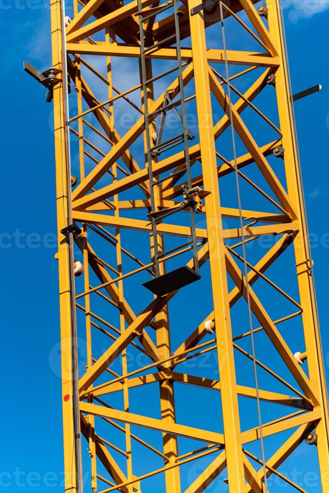 part of construction crane against sky photo