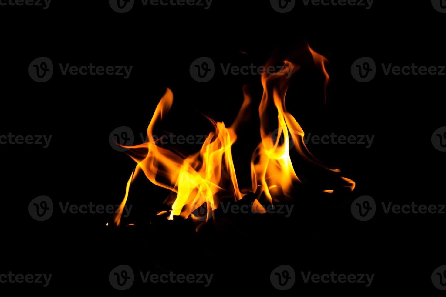 Fire flame texture. Burning material backdrop. Burn effect pattern. Blaze and torch wallpaper. Heat and haze backdrop. photo