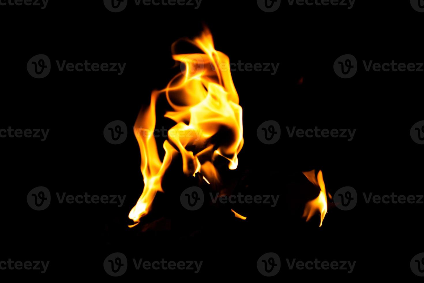 Fire flame texture. Burning material backdrop. Burn effect pattern. Blaze and torch wallpaper. Heat and haze backdrop. photo