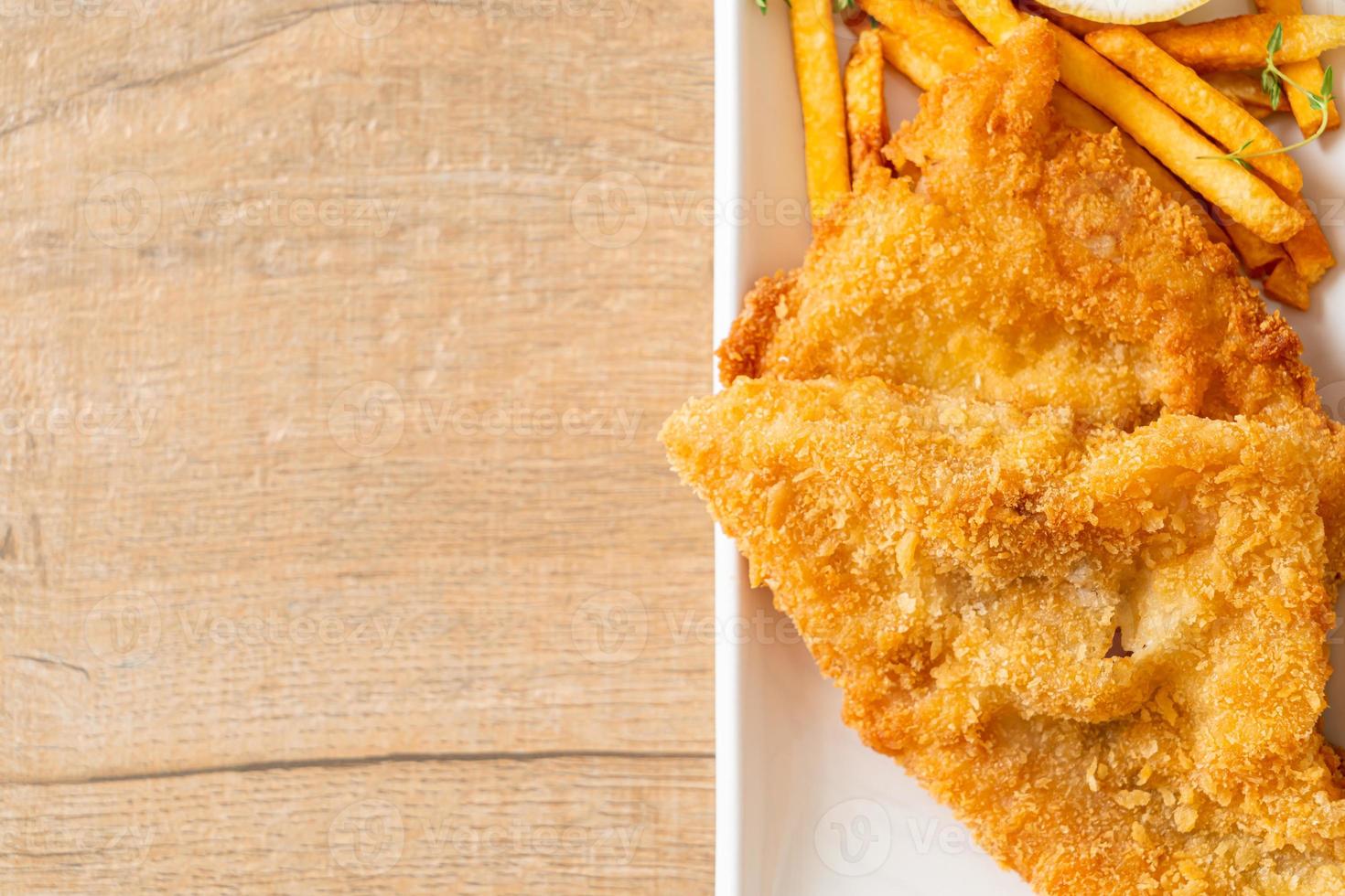 fish and chips - fried fish fillet with potatoes chips photo