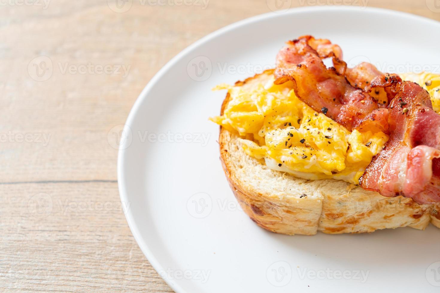 bread toast with scramble egg and bacon photo