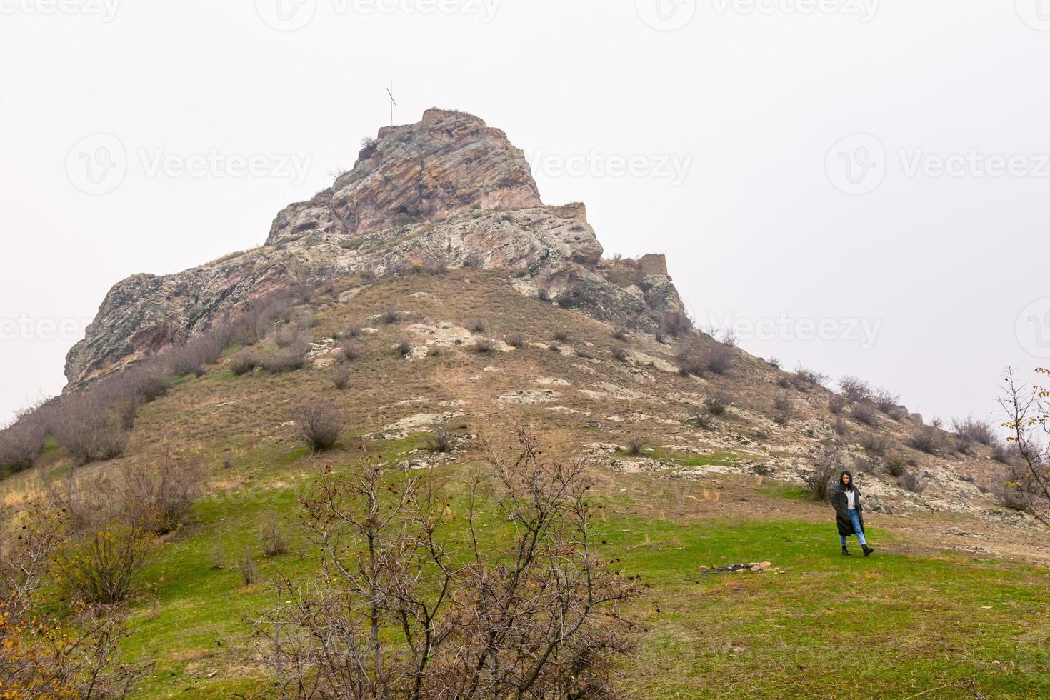 Female Tourist walking around fortress photo