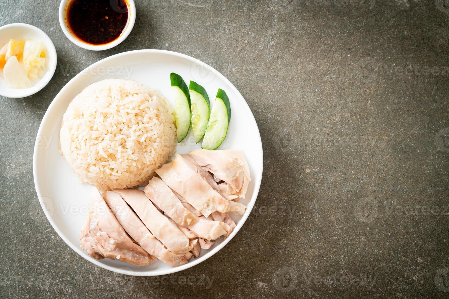 Hainanese chicken rice or rice steamed with chicken soup photo