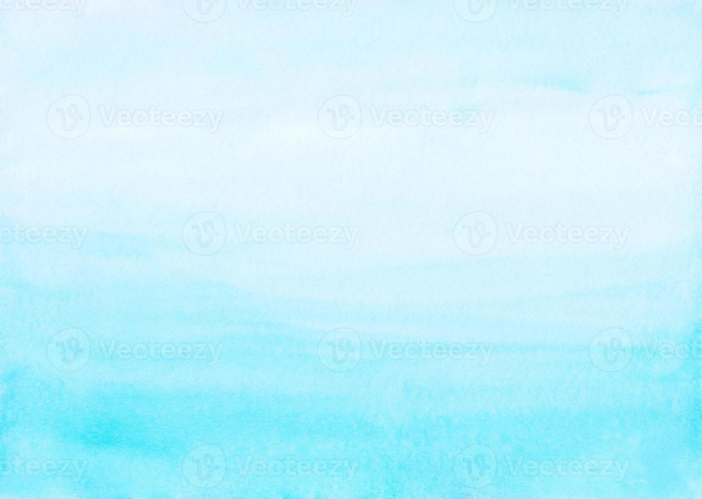 Watercolor light blue and white ombre background painting. Watercolour bright sky blue stains on paper. Artistic photo