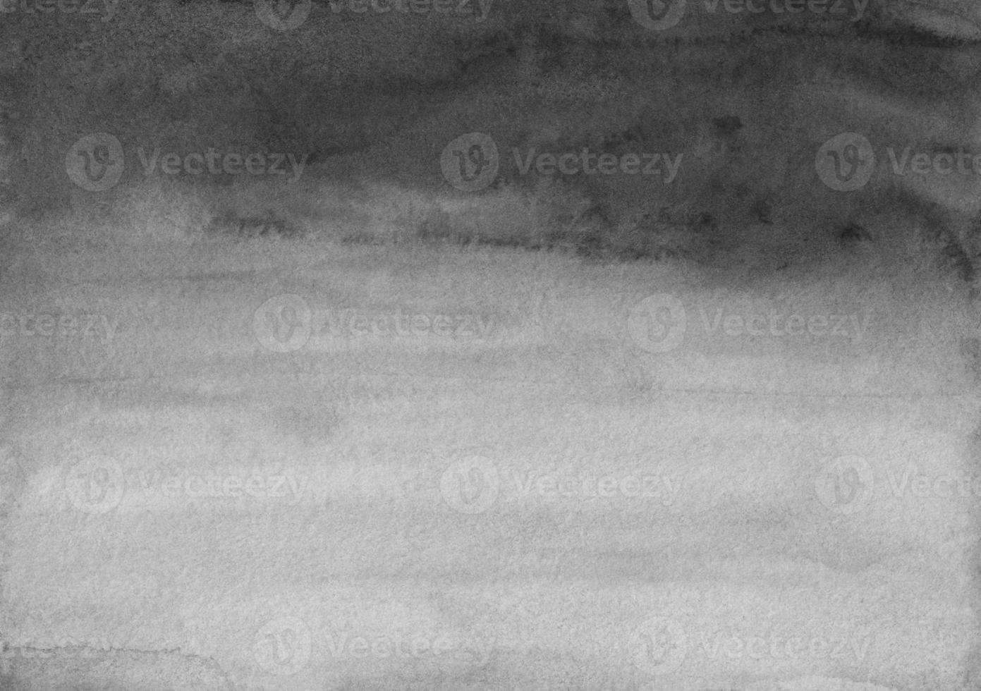 Watercolor black and gray background texture. Brush strokes on paper. photo
