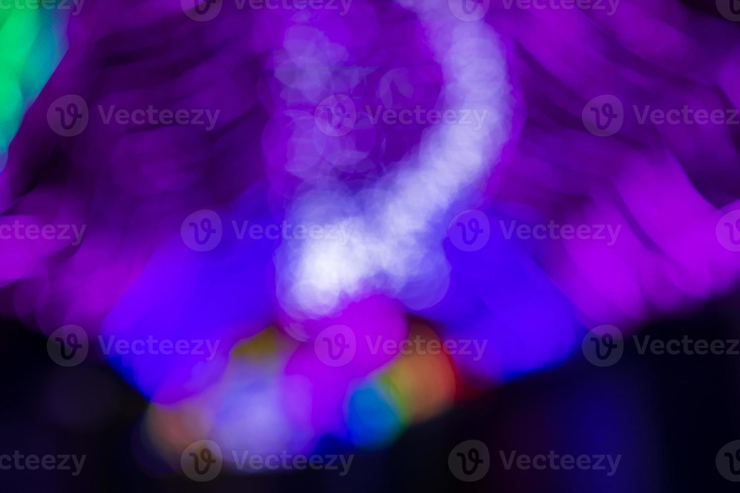 Colorful  Defocus Abstract bokeh light effects on the night black background texture photo