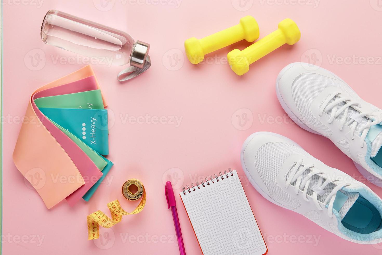 Creative flat lay of sport and fitness equipments. photo