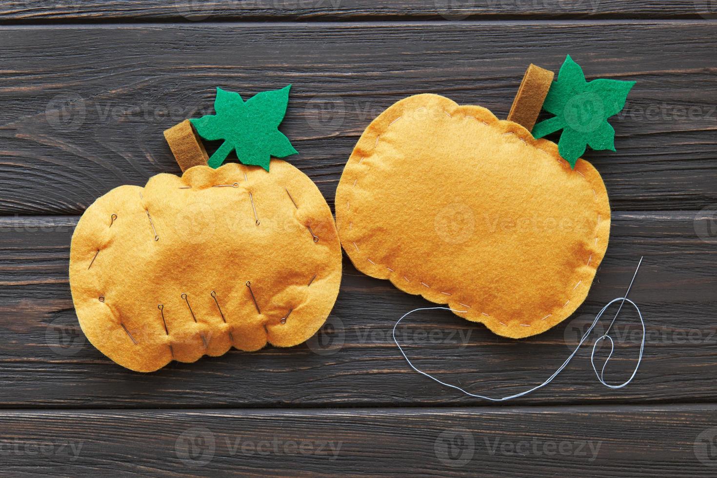 Step-by-step instructions for decorative crafts pumpkin made of felt for Halloween. photo