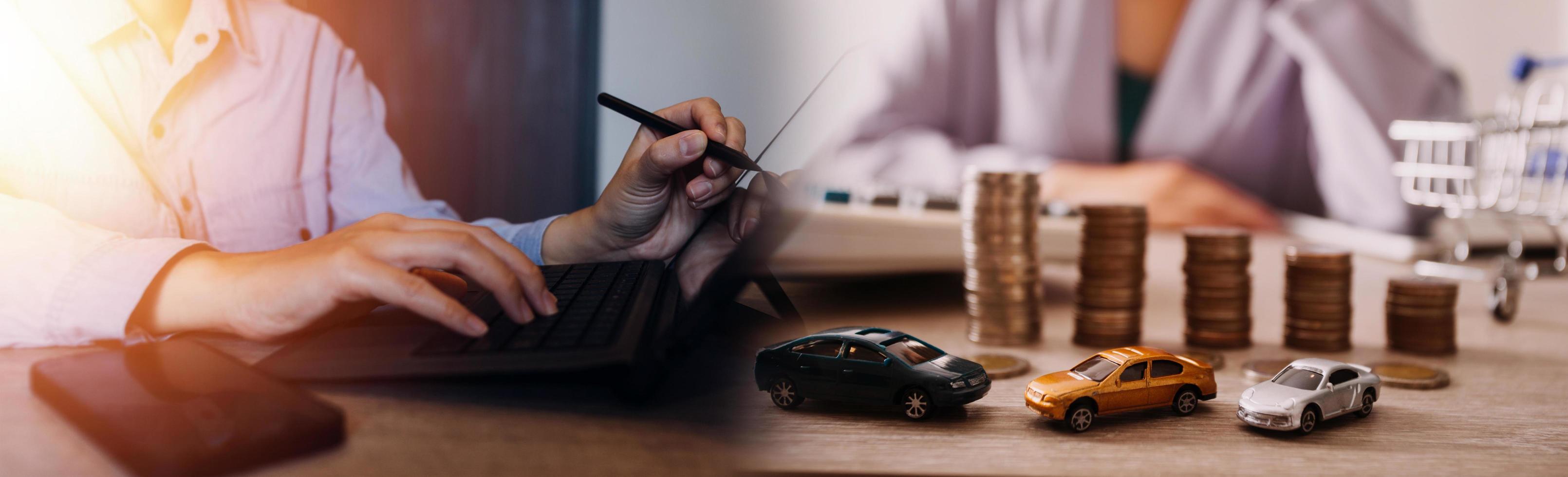 Businessman hands working with finances about cost and calculator and laptop with tablet, smartphone at office in morning light photo