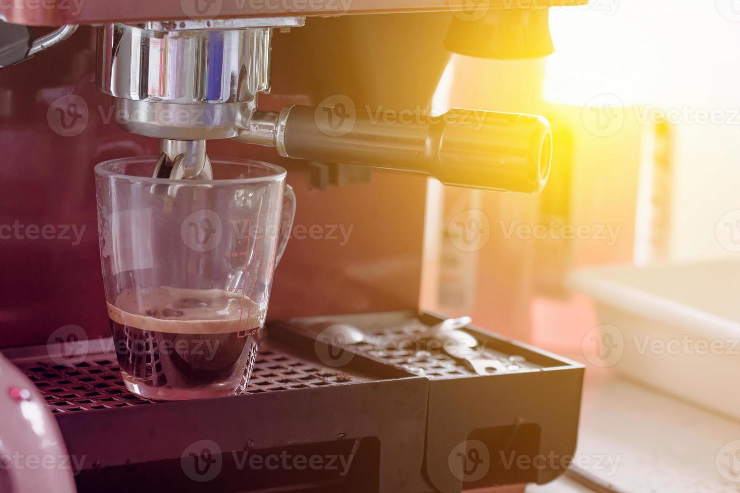coffee machine on table 12520672 Stock Photo at Vecteezy