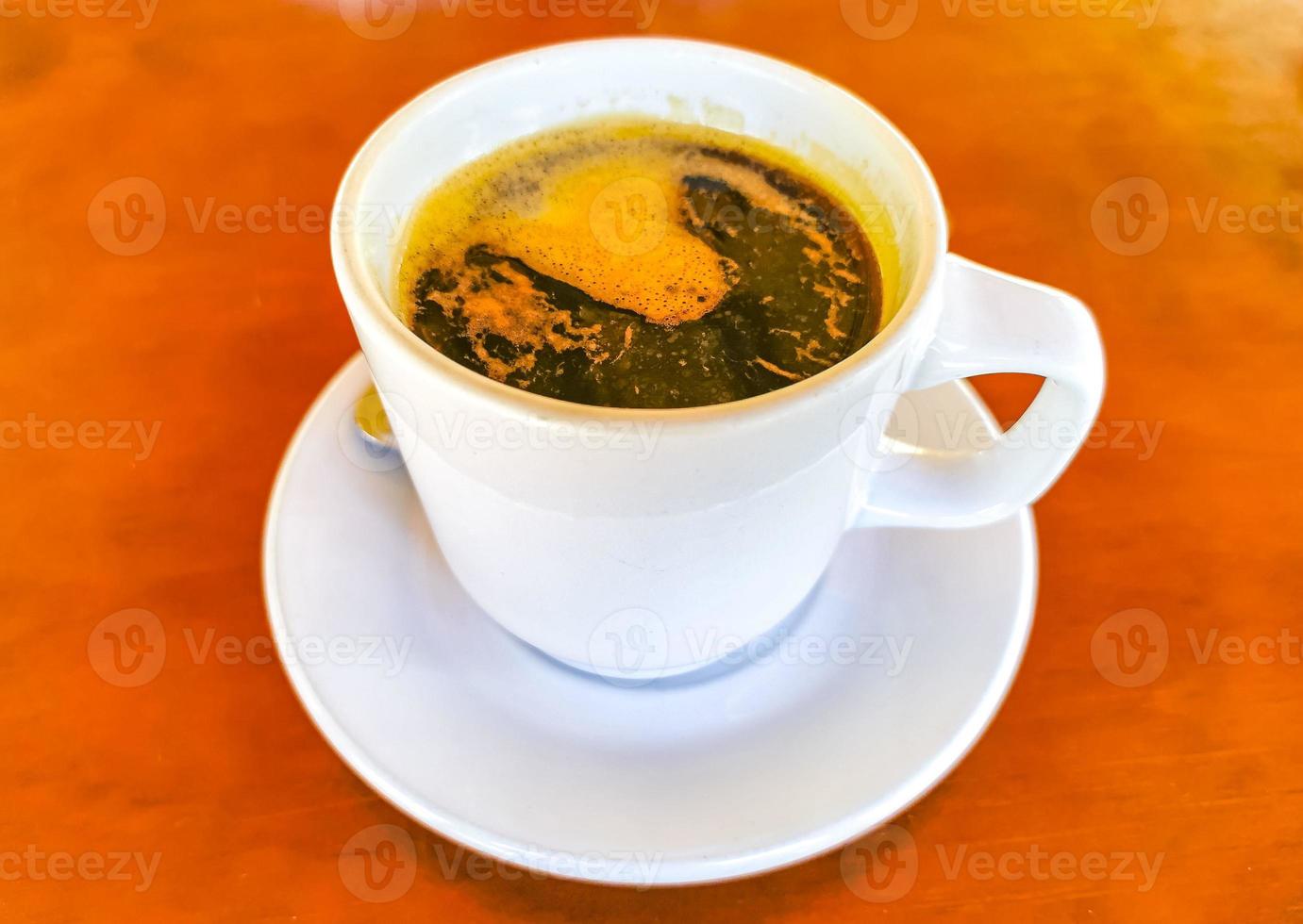 Cup of americano black coffee in restaurant Mexico. photo