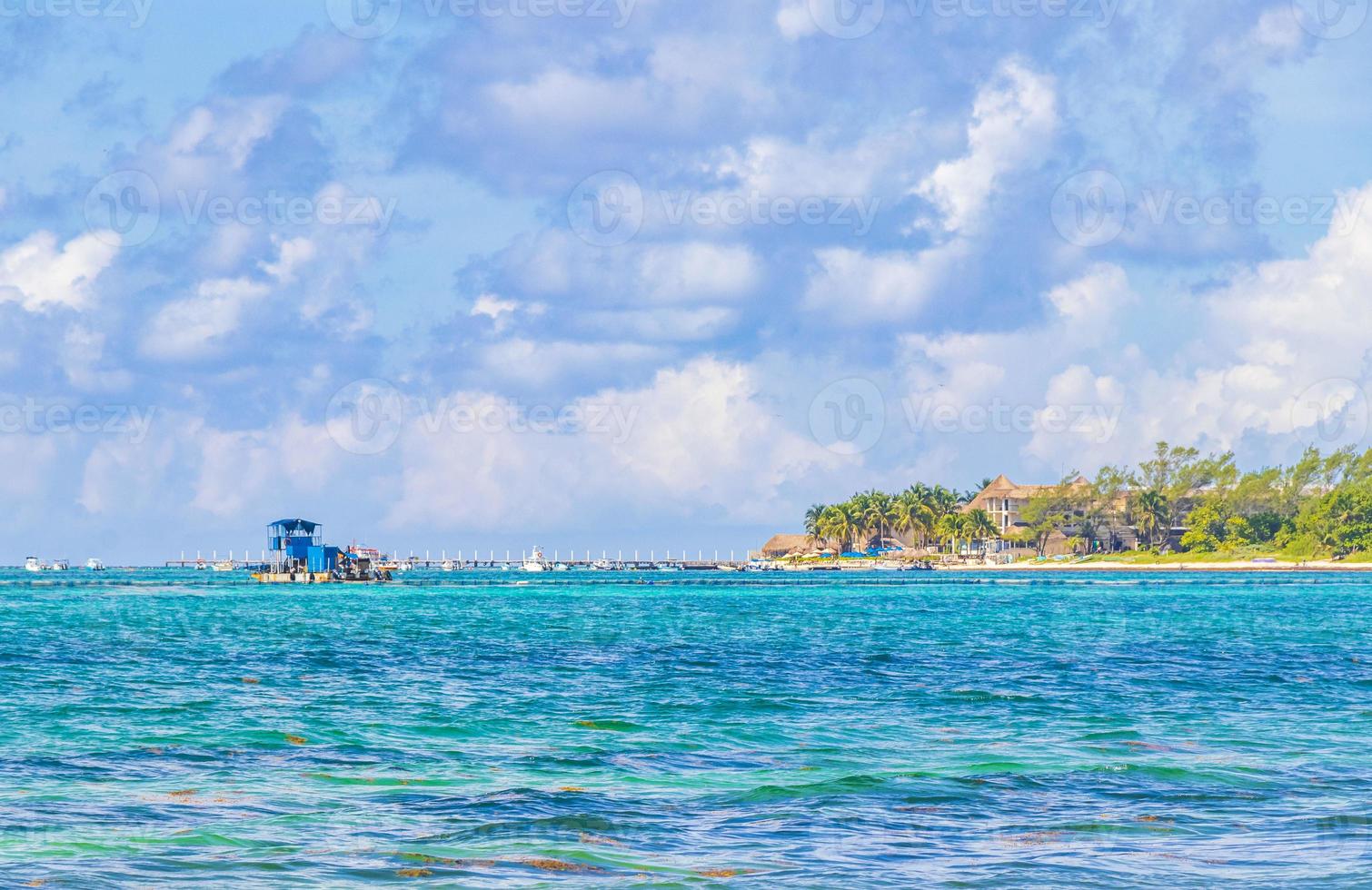 Boats yachts ship jetty beach in Playa del Carmen Mexico. photo