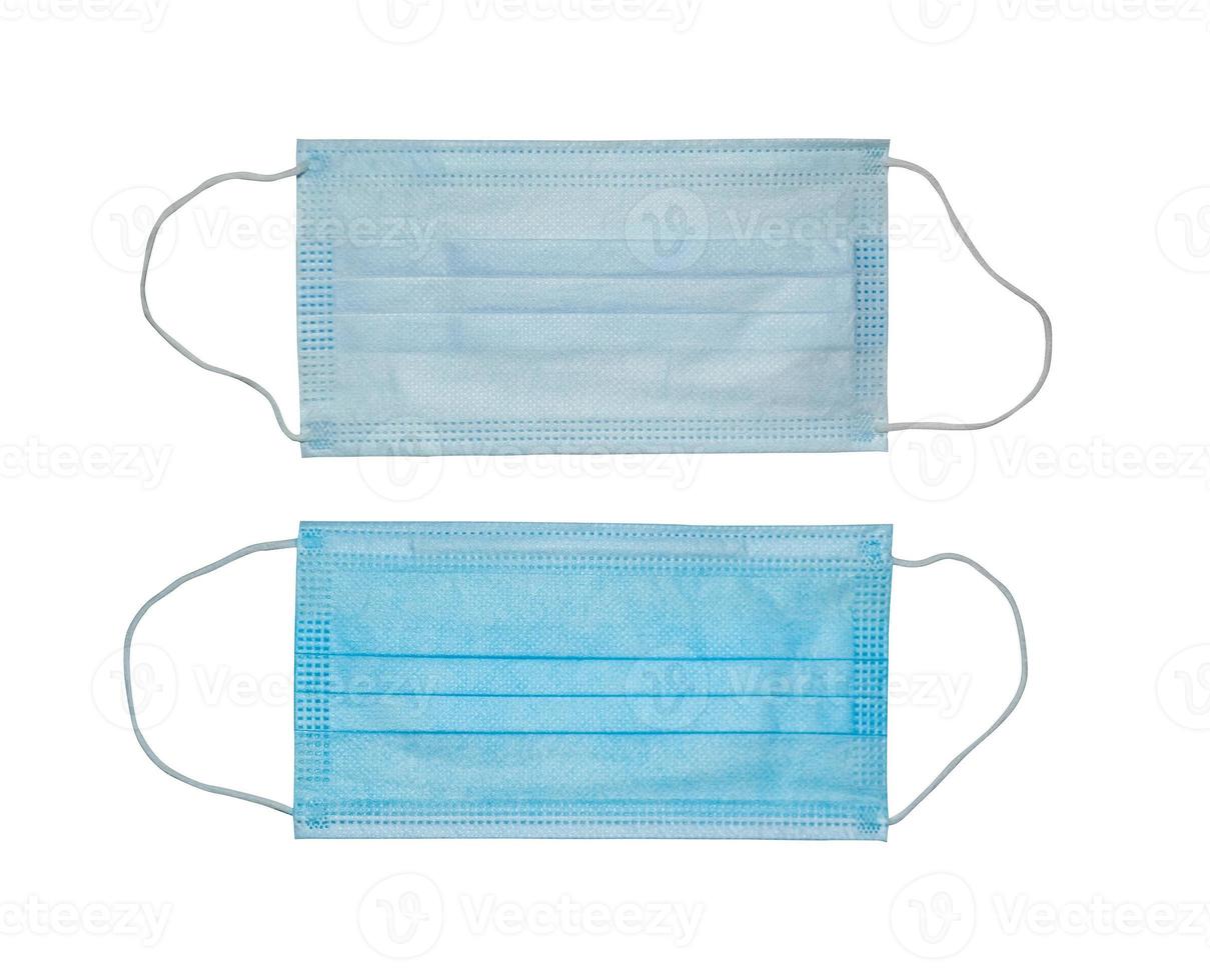 Medical protective disposable surgical face mask - both sides. Healthcare and medical concept. photo