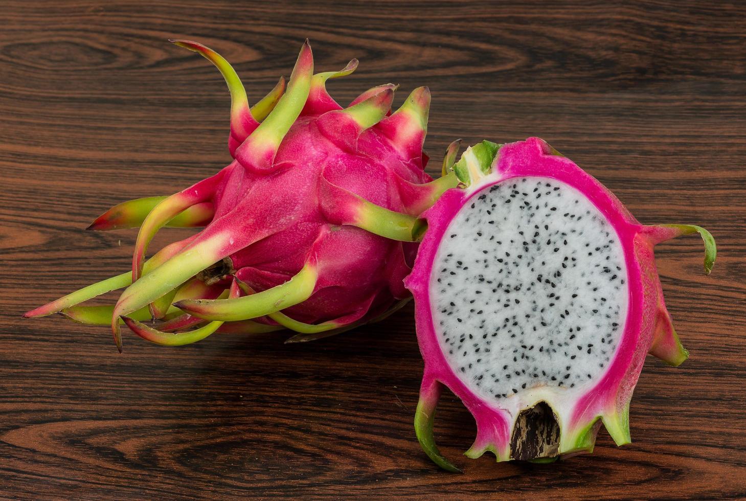 Fragon fruit on wooden background photo