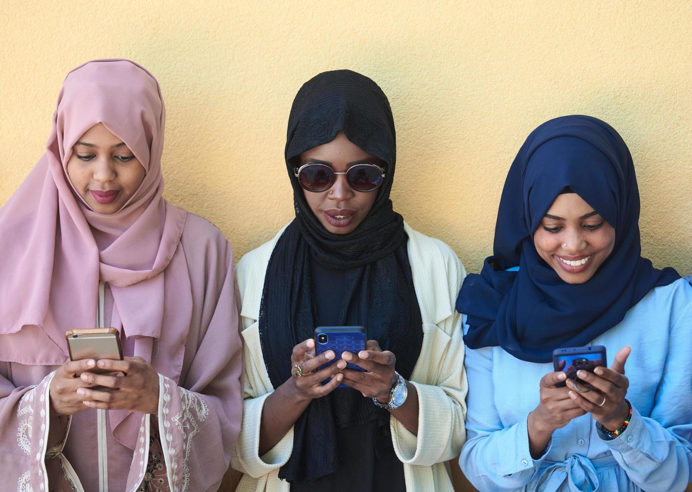 multiethnic startup business people group using smart phones photo
