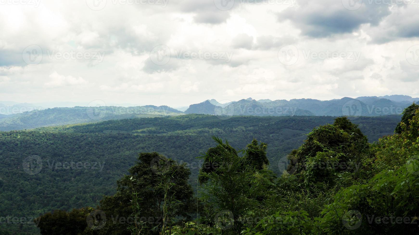 Panorama of high mountains in Thailand wonderful rainy season landscape in the mountains have the whole sky clouds and mist. photo