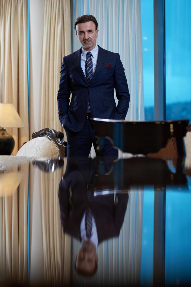 corporate business man portrait at luxury office photo