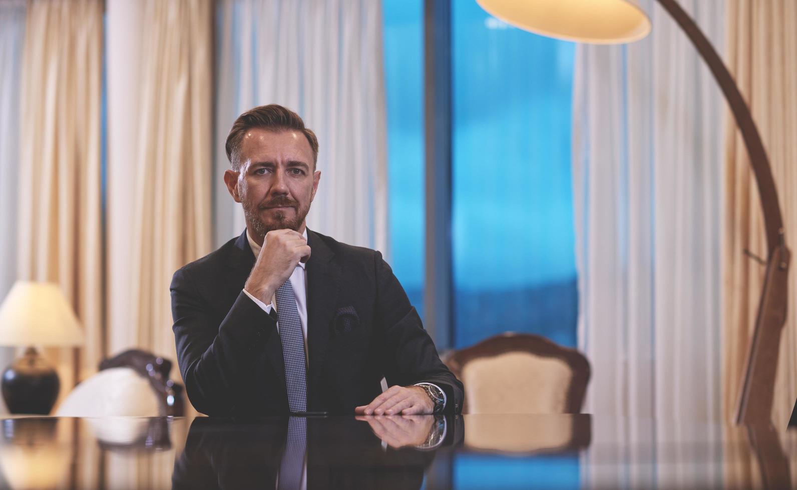 corporate business man portrait at luxury office photo