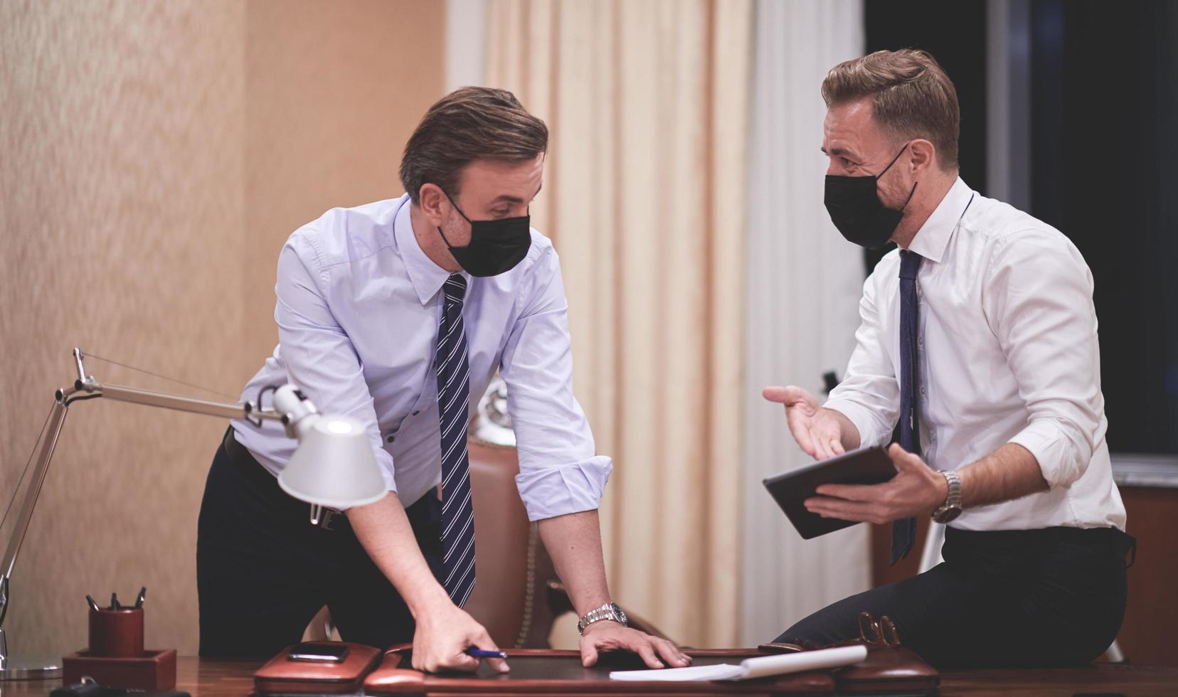 business people wearing crona virus protection face mask on meeting photo