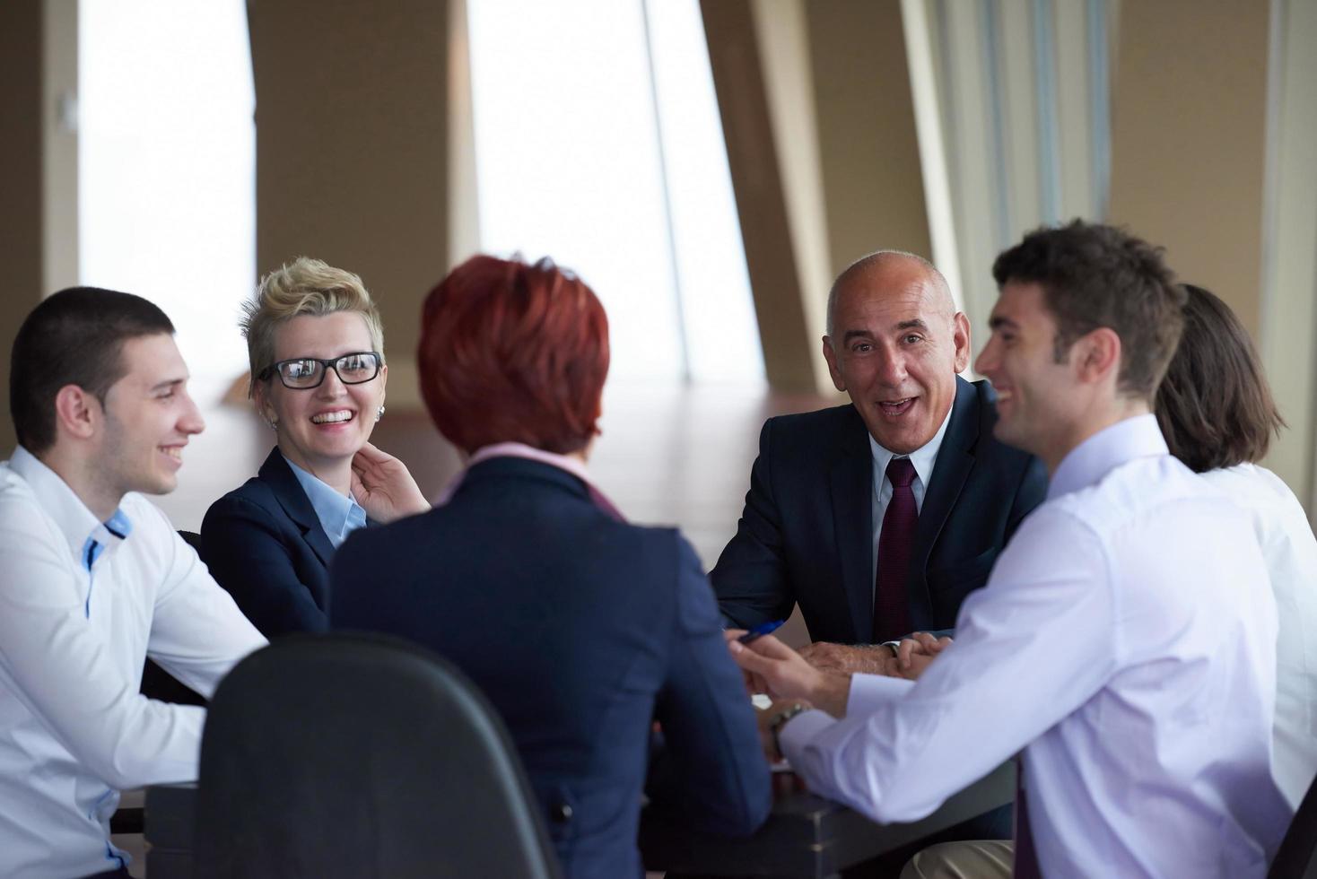 business people group on meeting at modern bright office photo