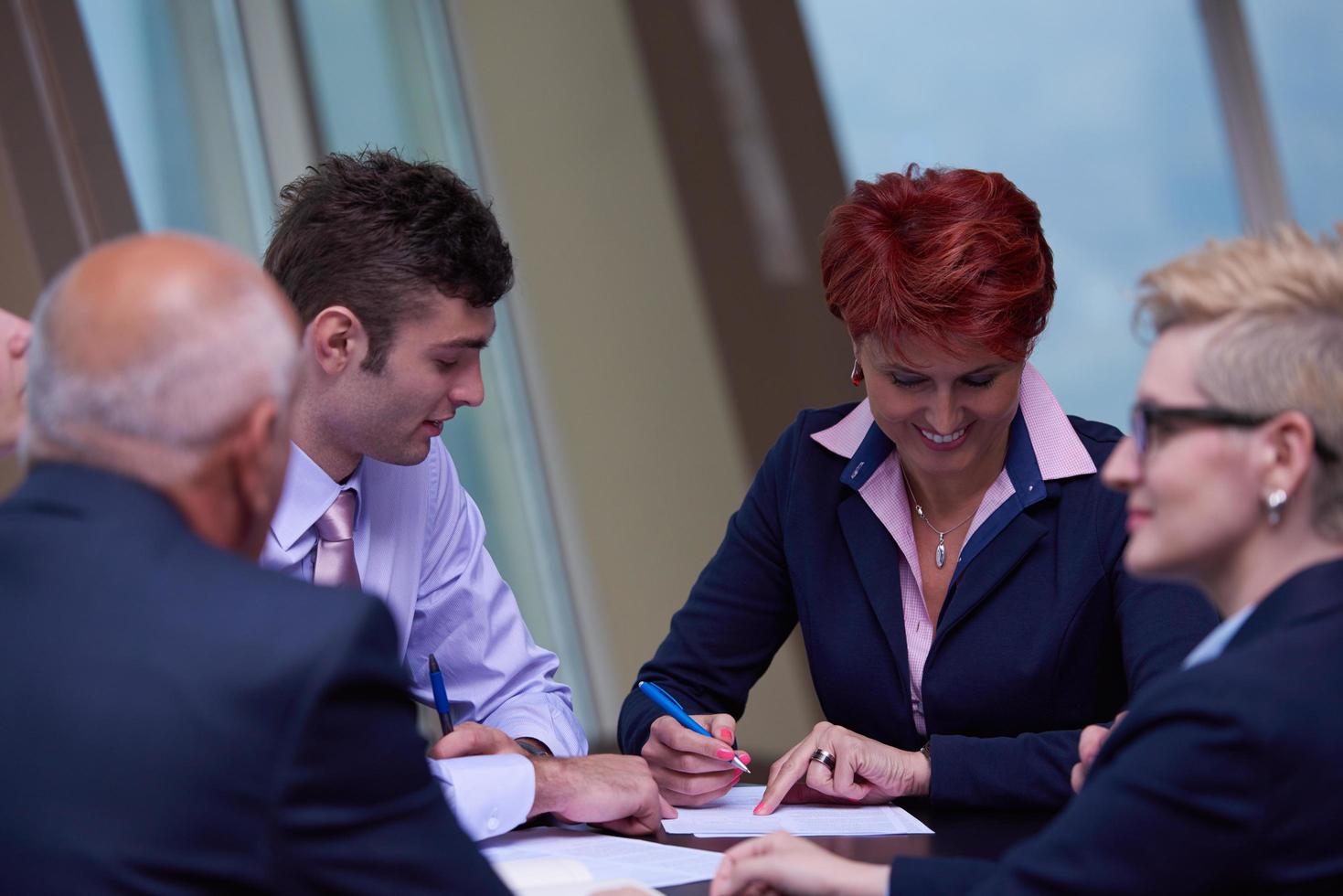 business people group sign contract photo
