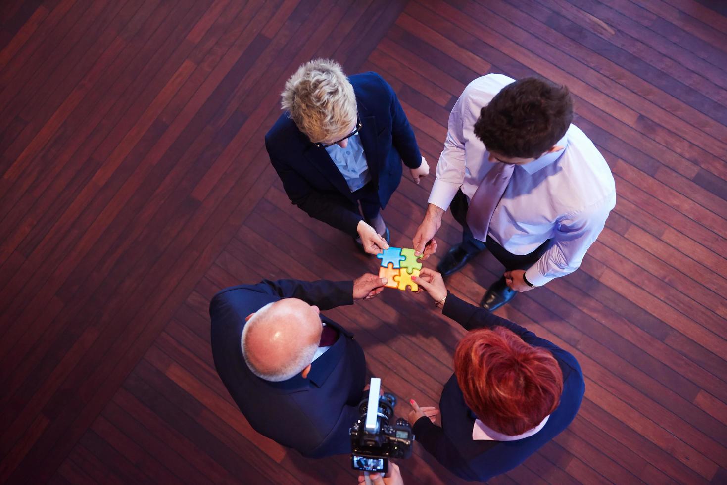 assembling jigsaw puzzle photo