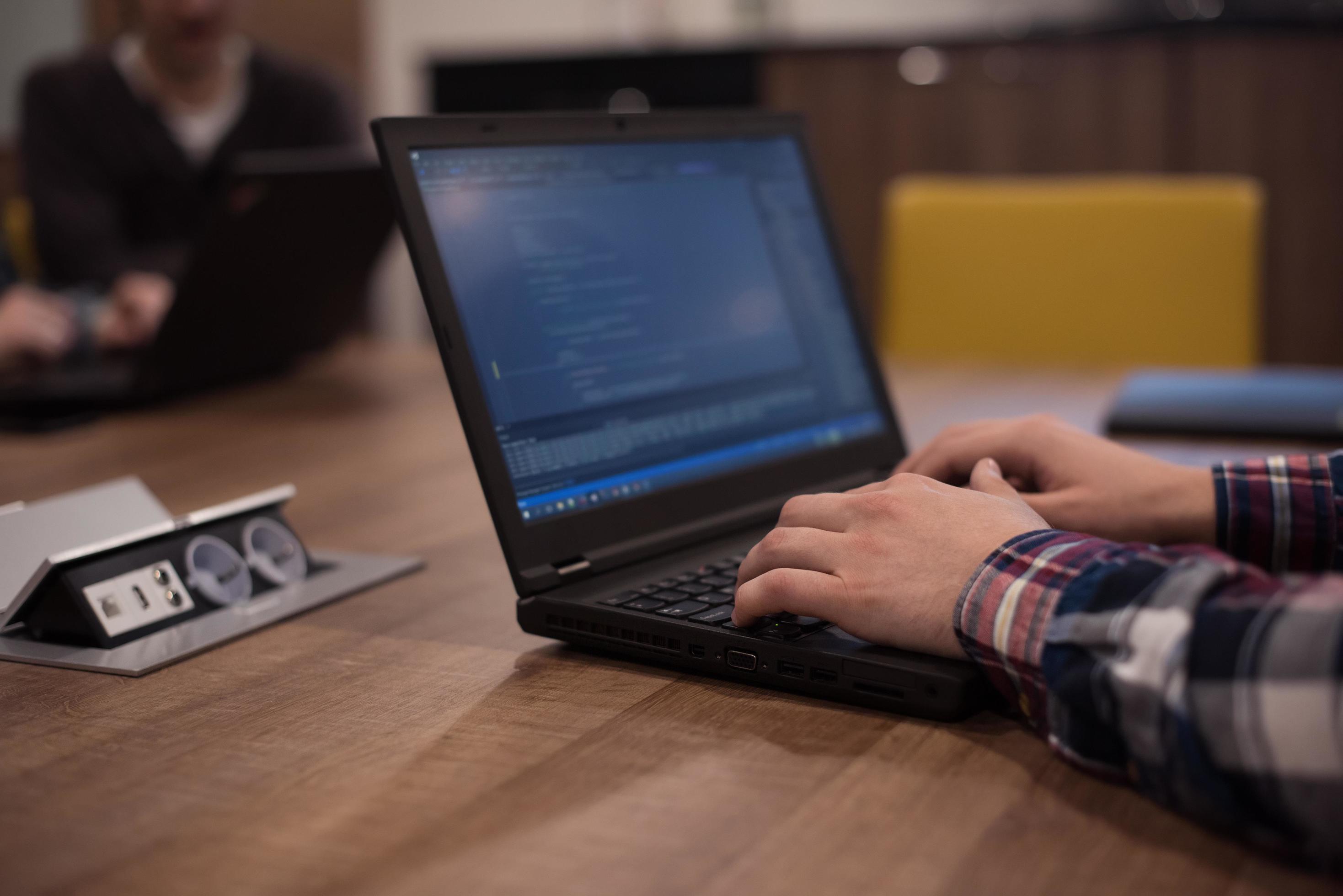 programmer writing programming code 12535172 Stock Photo at Vecteezy