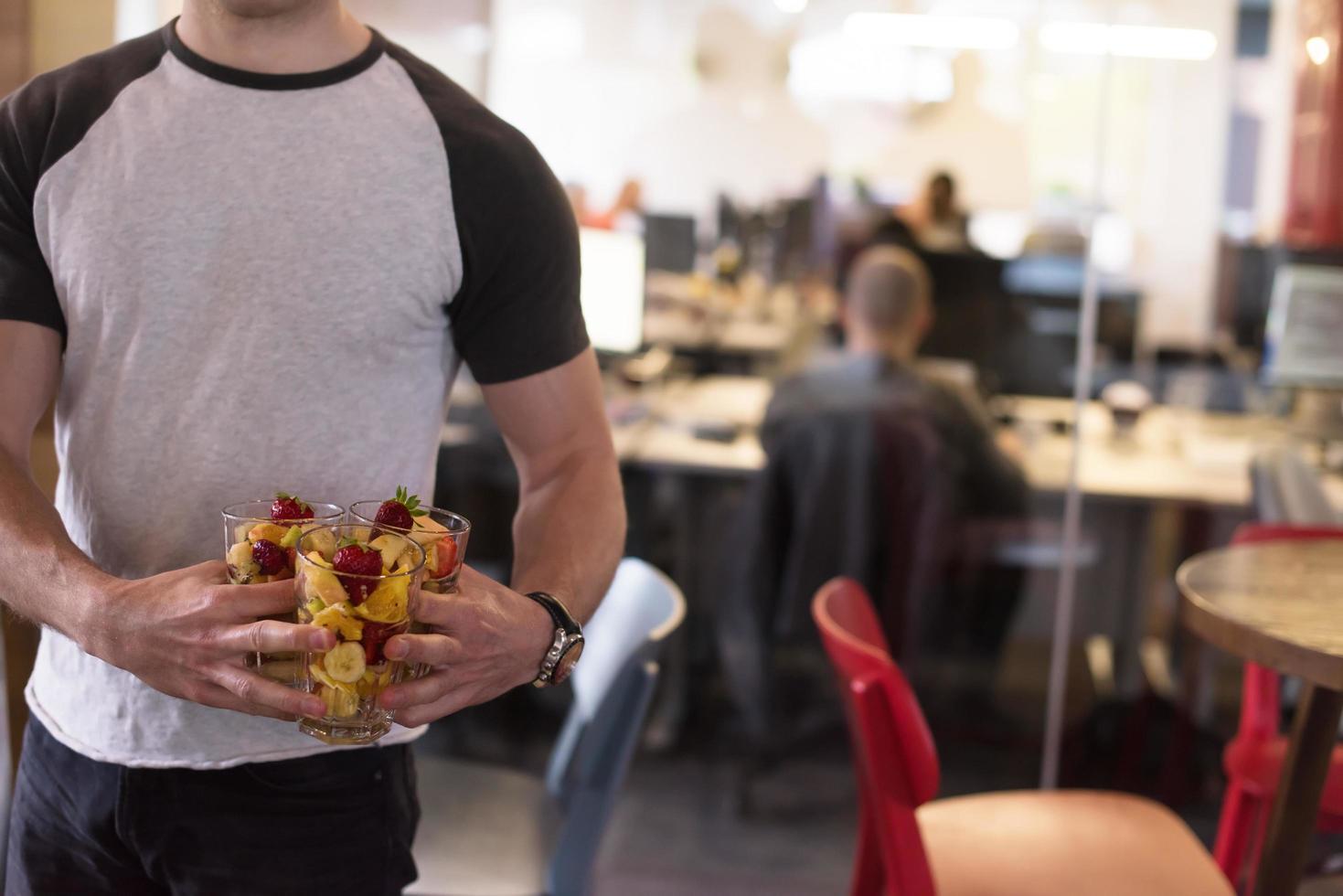 software developer eating a fruit salad photo